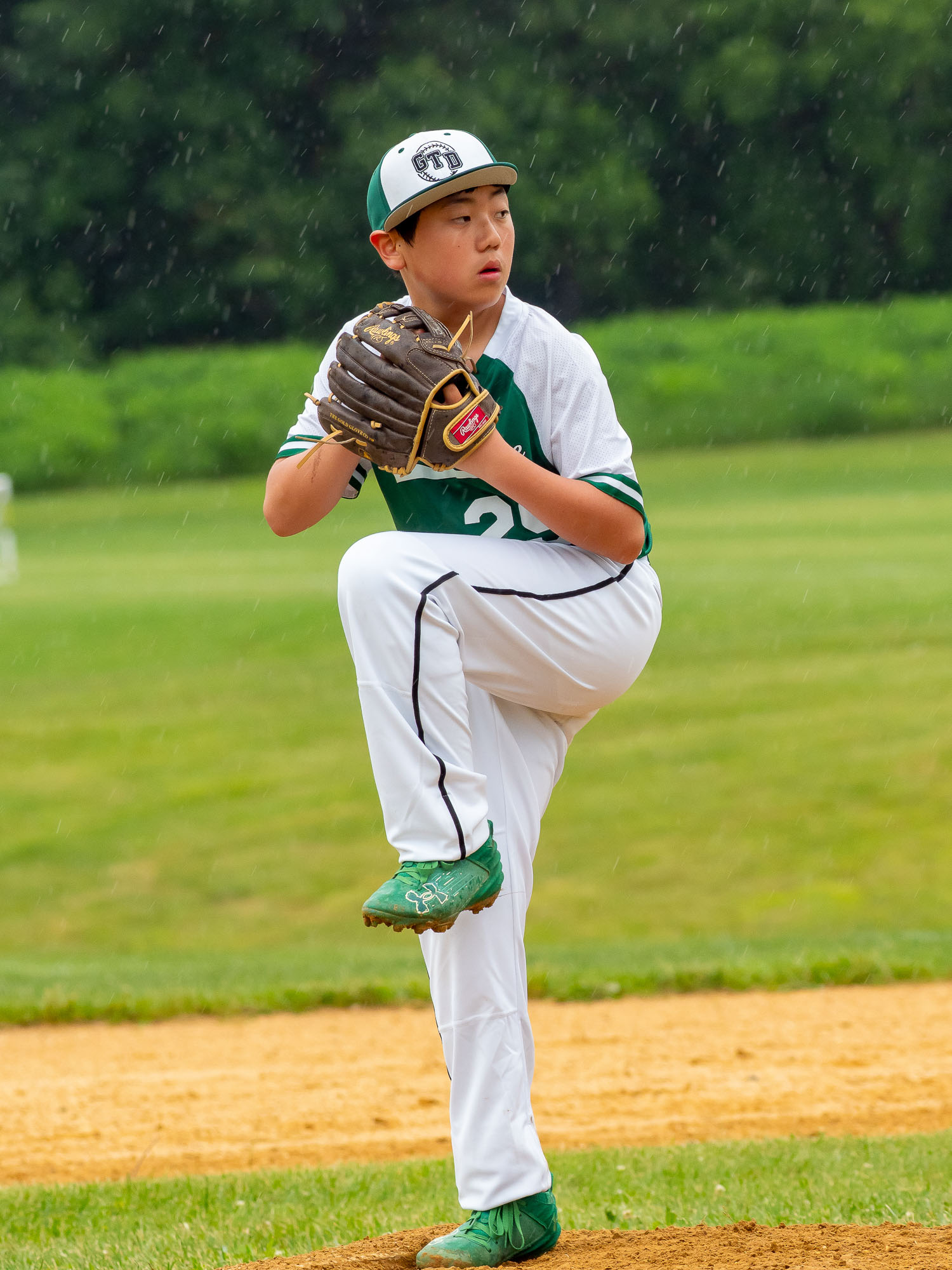 Runner on base in the rain
