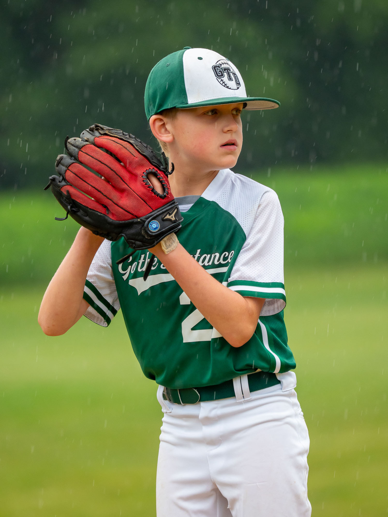Youth baseball in the rain